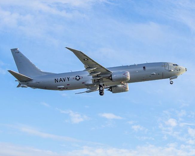 P-8A「海神」偵察機日前載有CNN電視拍攝小組,在中國南海上空偵察。(美國海軍圖片)