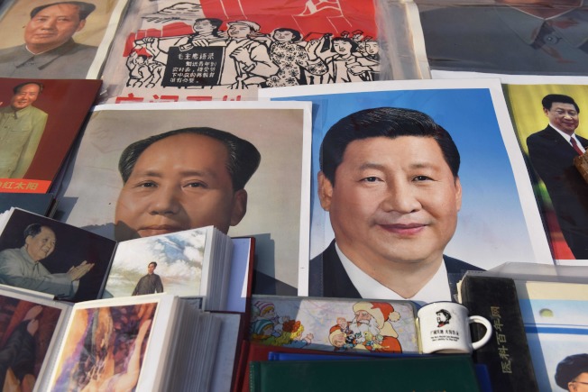 习近平(右)任内将他的姓名写入宪法序文,跟毛泽东平起平坐。(Getty Images)