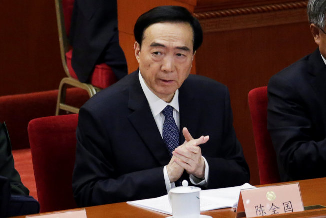新疆维吾尔自治区党委书记陈全国3日出席在北京人民大会堂举行的政协会议开幕式。(路透)