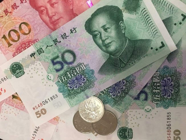 人民币跌至逾四个月新低 “破7”疑虑升高